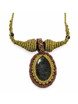 Detalle del doble engarce con obsidiana dorada y ojo de tigre