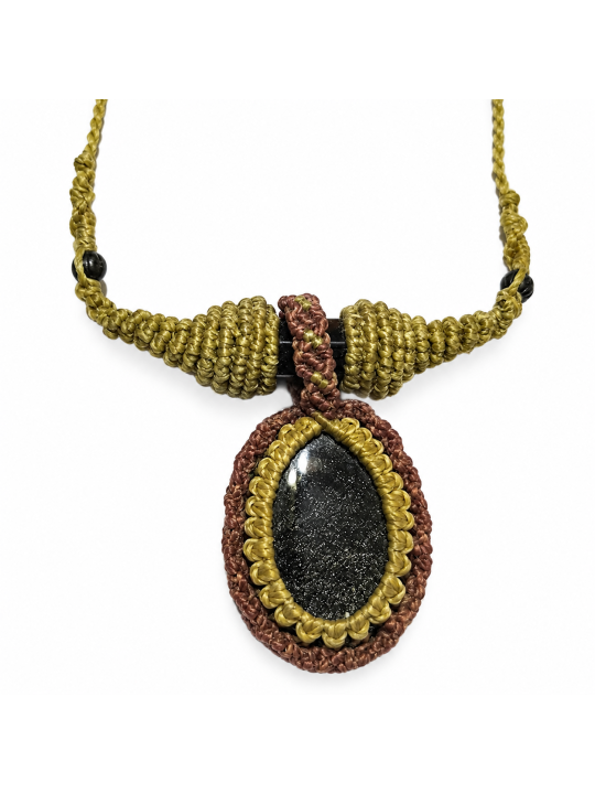 Detalle del doble engarce con obsidiana dorada y ojo de tigre